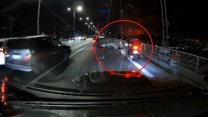 Otomobil 15 Temmuz Şehitler Köprüsü'nde motosikletli trafik polisine çarptı: O anlar kamerada!