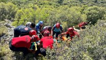 Fethiye'de kayalıklara düşen yamaç paraşütü pilotu yaralandı